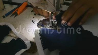 缝纫机在纺织品上缝合